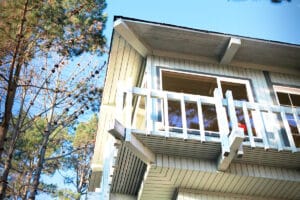 Outside of the building at Cypress Ridge showing windows and trees