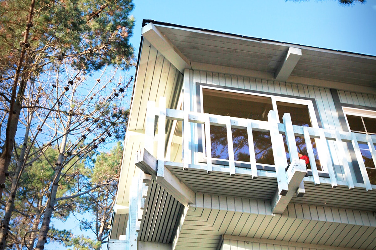 Outside of the building at Cypress Ridge showing windows and trees