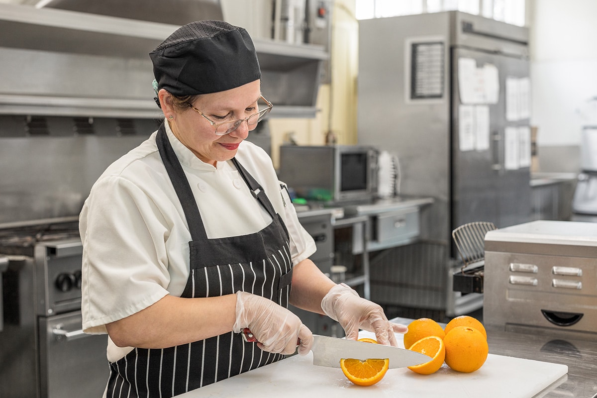 Chef in the kitchen at Cypress Ridge