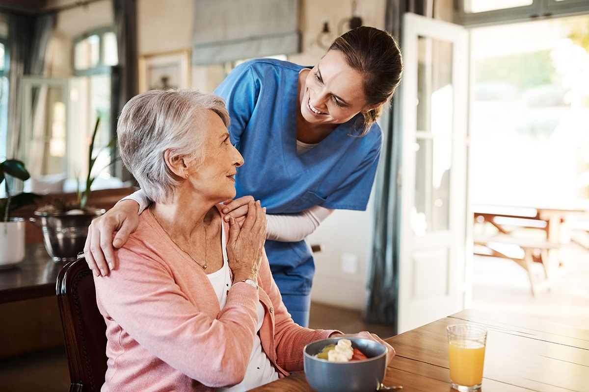 yolo-300x200-51 woman with nurse with breakfast at her home